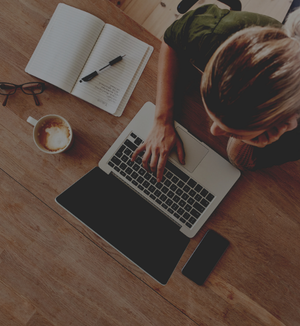 Working on laptop at desk